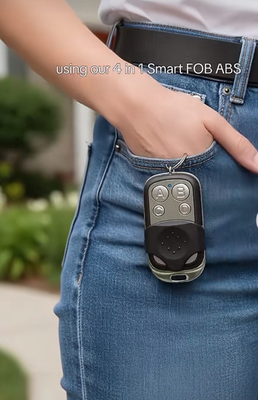 Remote key copier clipped to a belt